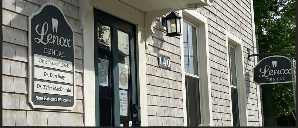 The Lenox Dental entrance sign at 140 Water Street, listing the dentists and welcoming new patients